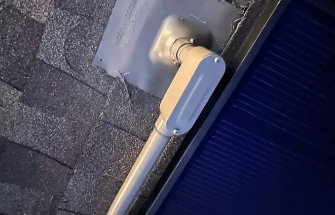 Solar Panel Installation with Roof-Mounted Conduit Box