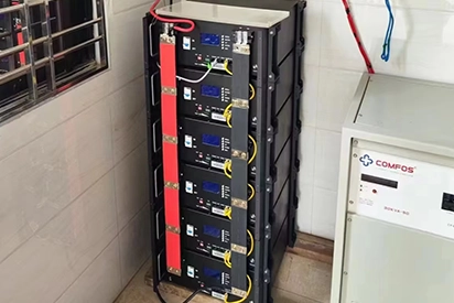 Battery Bank Installation in an Indoor Room with Wiring and Equipment